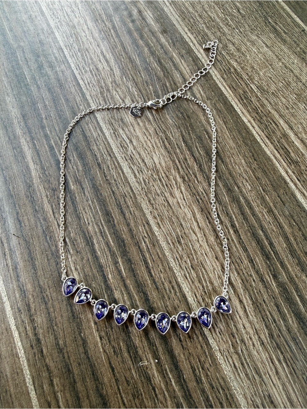 Touchstone Crystal Silver Necklace with Purple Teardrop Crystals